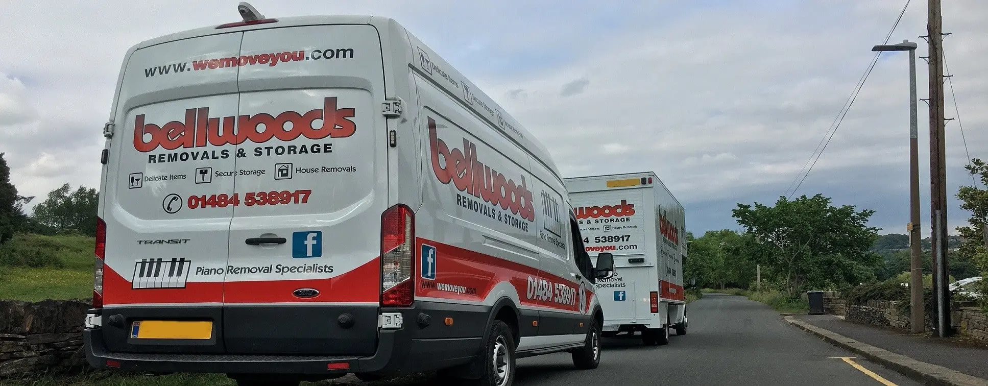 Two Bellwoods Removals vans on a Yorkshire road — house removals and piano specialists serving Huddersfield and West Yorkshire